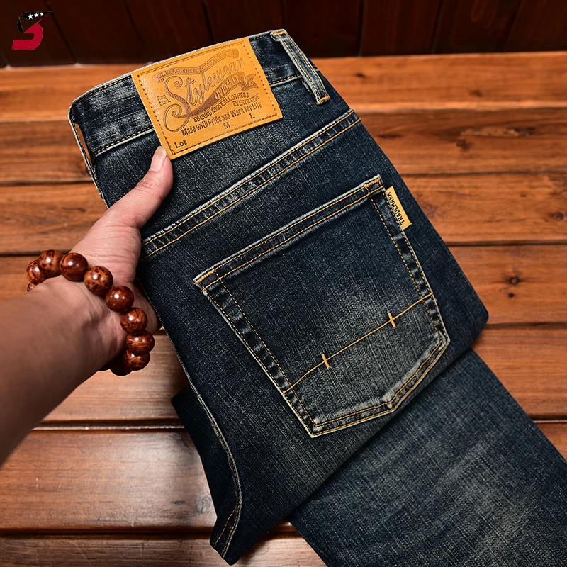 高端牛仔裤男春秋款潮牌复古做旧刺绣修身直筒美式高街男裤长裤子