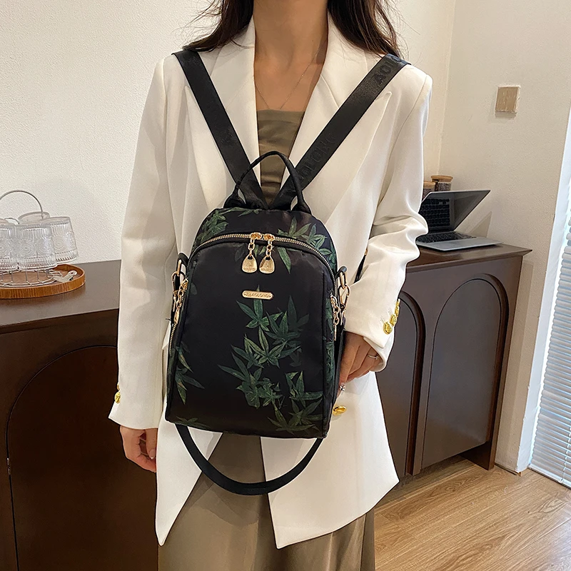 轻奢民族风新款三用时尚女士双肩包南韩丝背包百搭旅行帆布书包