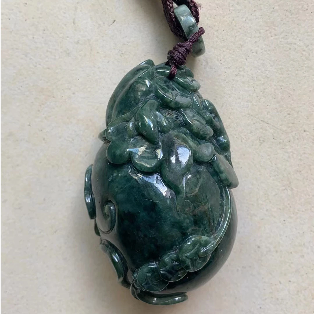 天然翡翠特色老蓝水腾冲老料袋袋有钱手把件