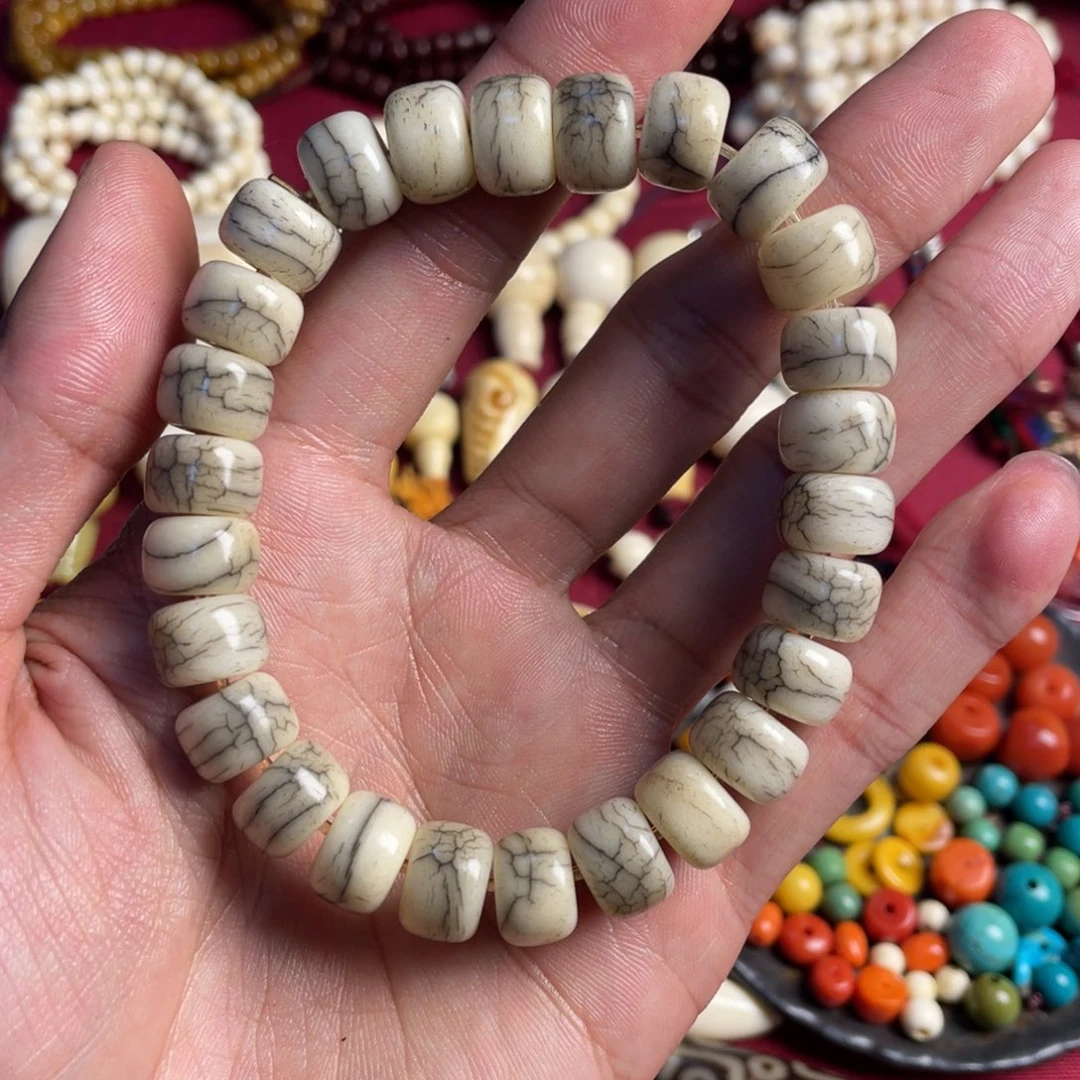 橄榄核核雕藏传配饰