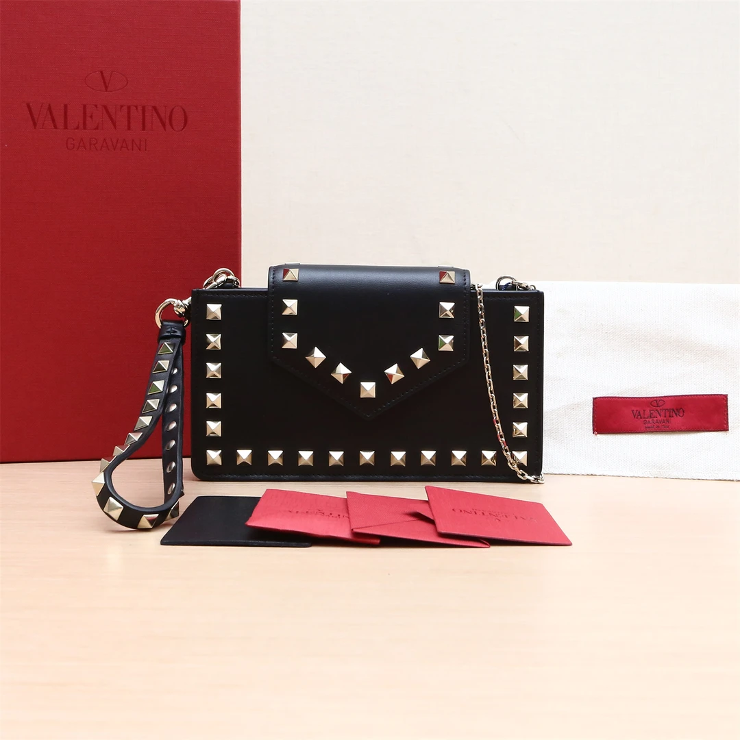 99新 Valentino/华伦天奴 小花柳 华伦天奴 手拿包 黑色 金扣