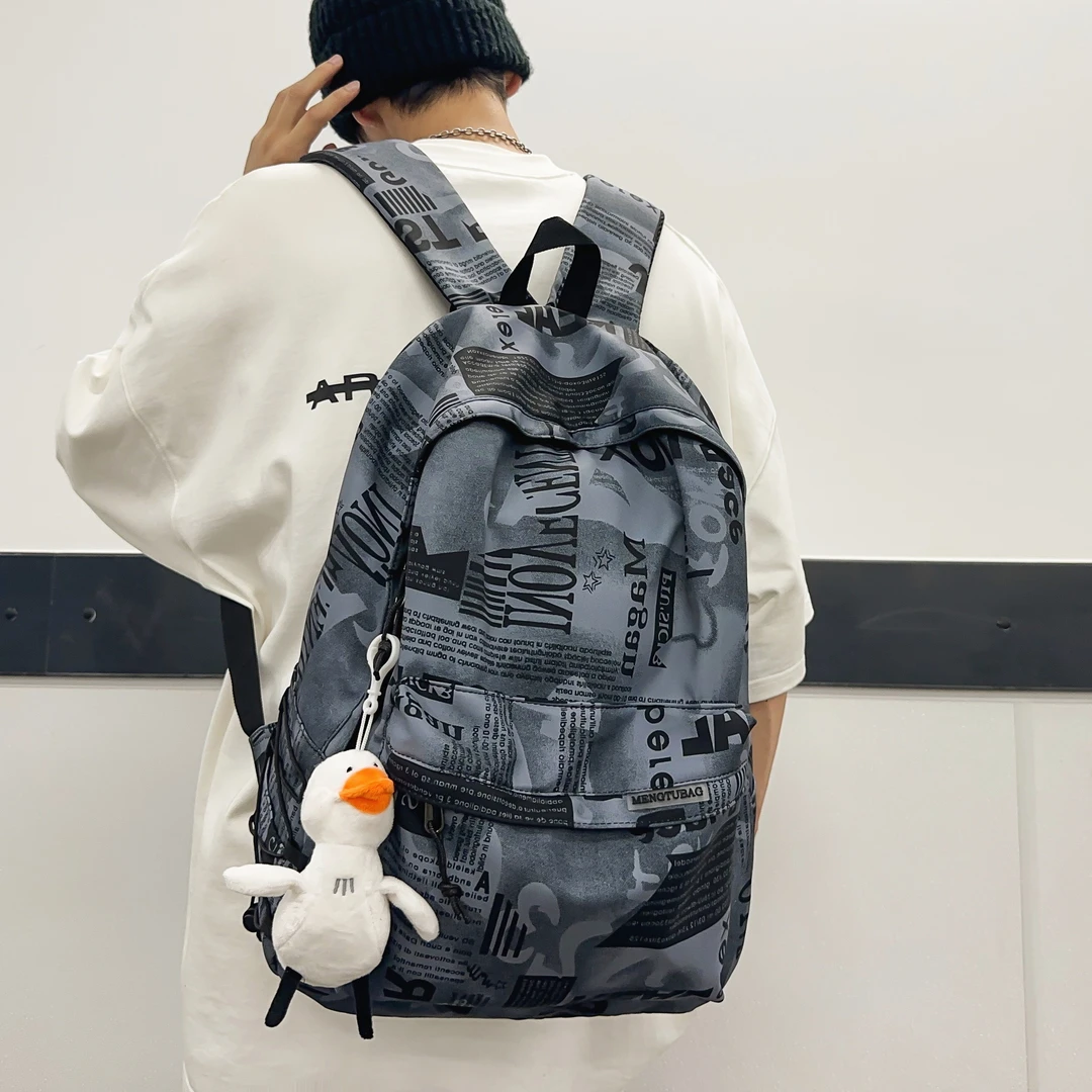 日韩潮流个性男女学生双肩包大容量防水初中书包电脑包简约旅行包