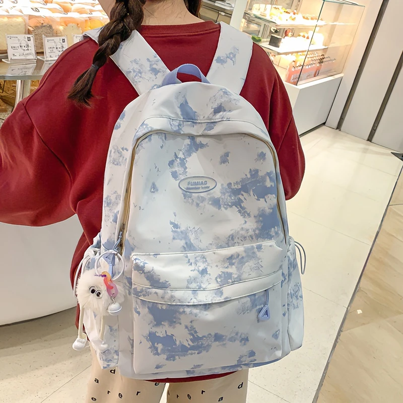 书包女小学生三到五六年级初中生小众扎染背包2025新款旅行双肩包