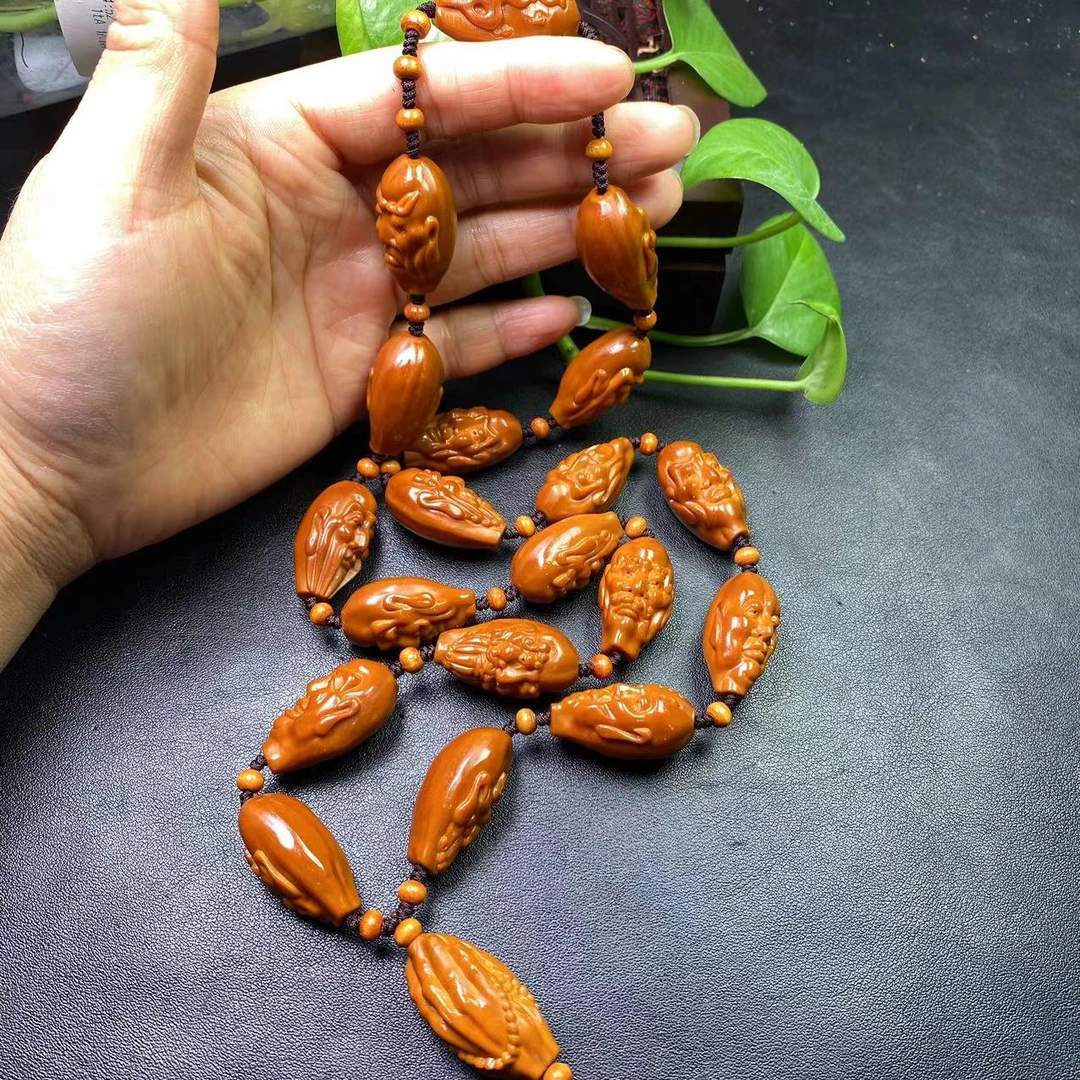金刚结须派罗汉脖挂橄榄核核雕雕刻