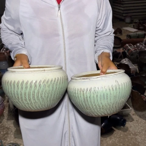 红陶20CM以下口19高14瑕疵