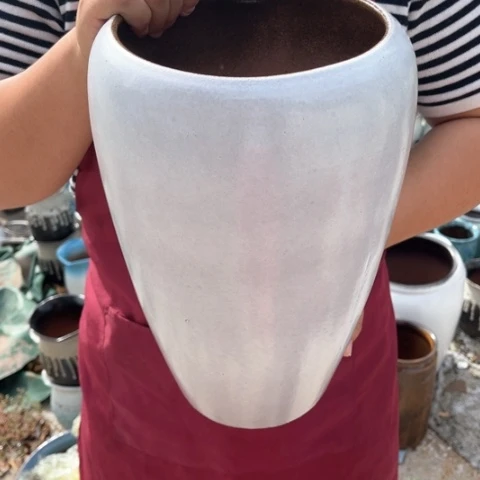 红陶20CM以下口15高33瑕疵