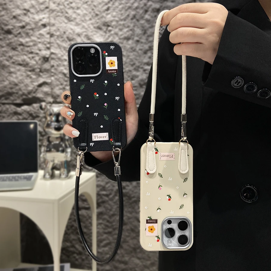 韩系满屏碎花蝴蝶结适用iphone16pro手机壳苹果15手拎挂绳14银框