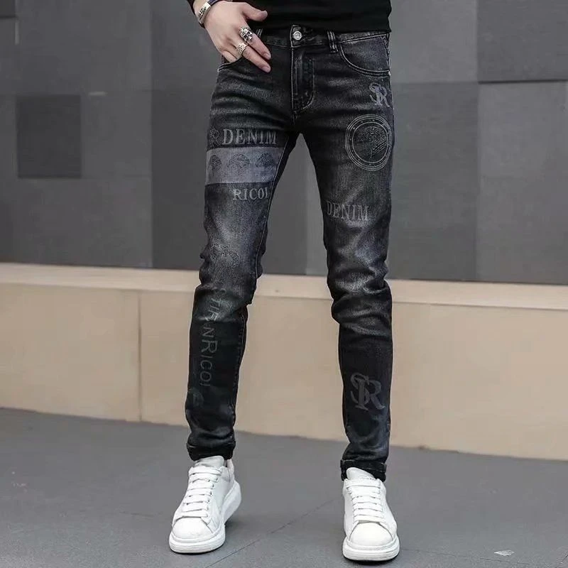 欧洲站高端黑色牛仔裤男士秋冬刺绣印花弹力修身型百搭小脚裤子男