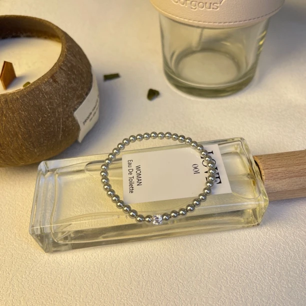 925银仿珍珠银制品 灰色贝珠锆石弹力绳手链 7815