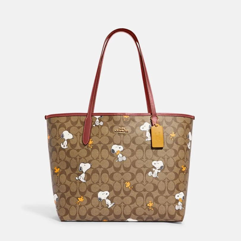 COACH/蔻驰 奥莱史努比联名款时尚卡其色经典标志CITY托特手提包