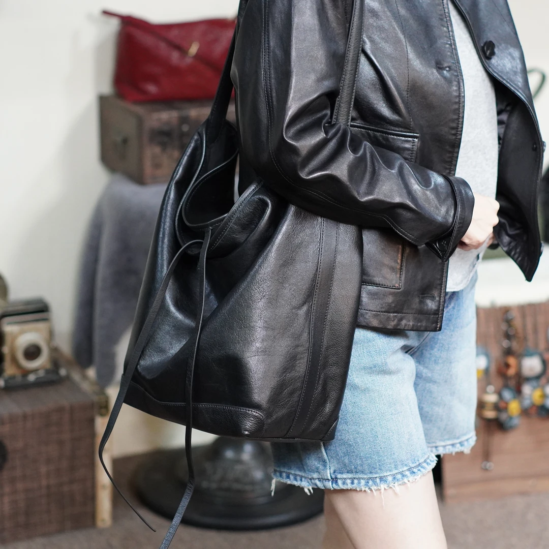 [冰语]2024秋冬百搭慵懒新款真皮女包小众设计单肩水桶包-241010