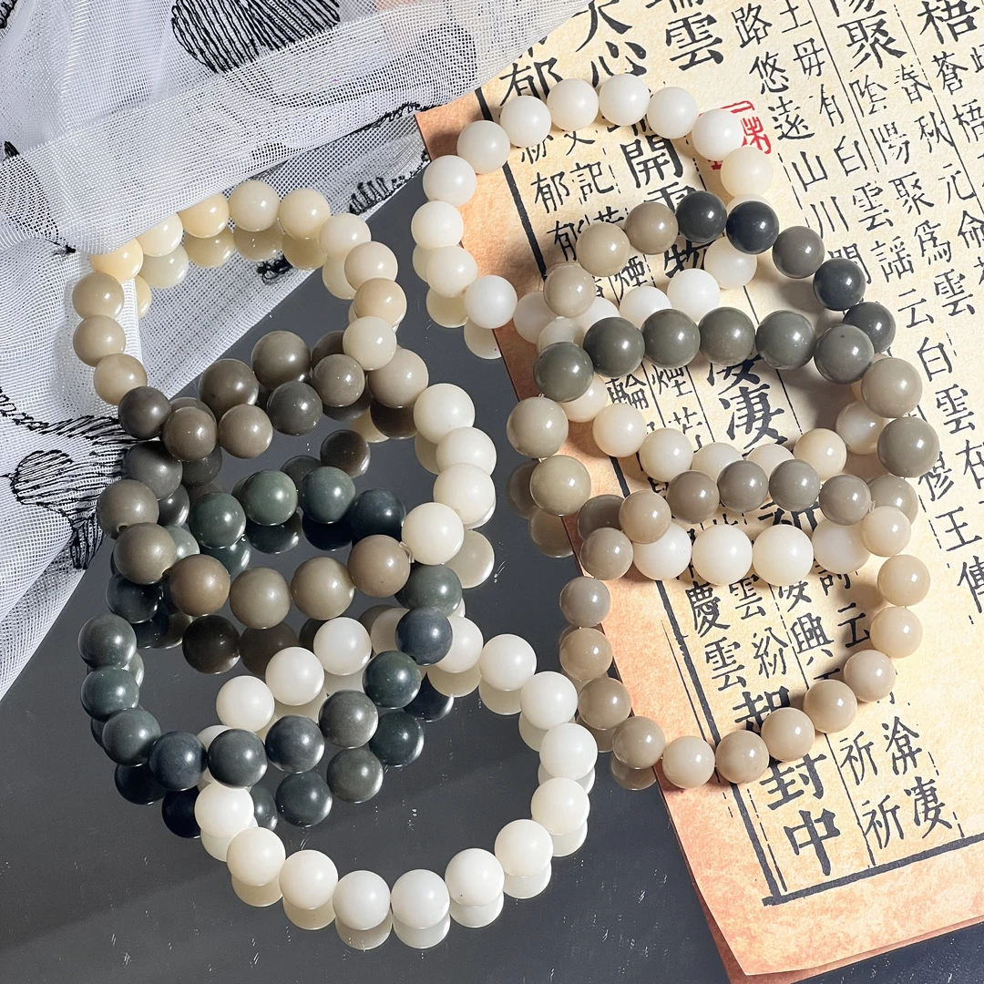 白玉菩提多宝绕指柔手串（颜色随机发）