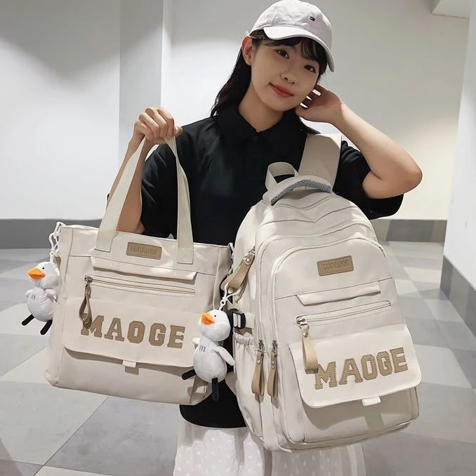 大容量书包多层初中生女生高中学生高中生背包双肩包减负大学生