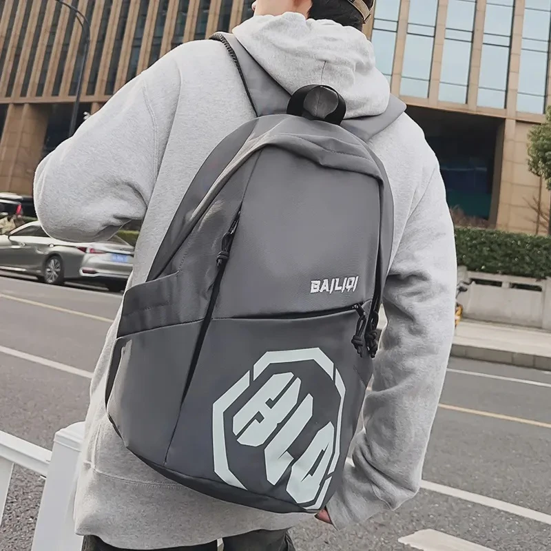 男士时尚休闲户外双肩包防水潮流高中初中大学生书包男款韩版个性