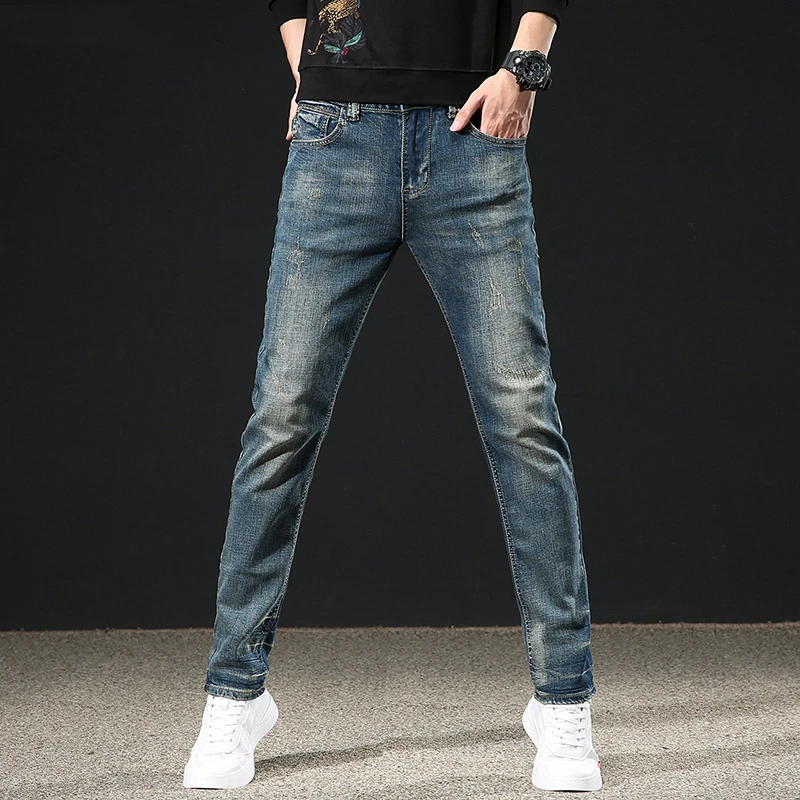 潮流复古牛仔裤男士春秋款修身小脚弹力做旧男裤时尚潮牌绣标长裤