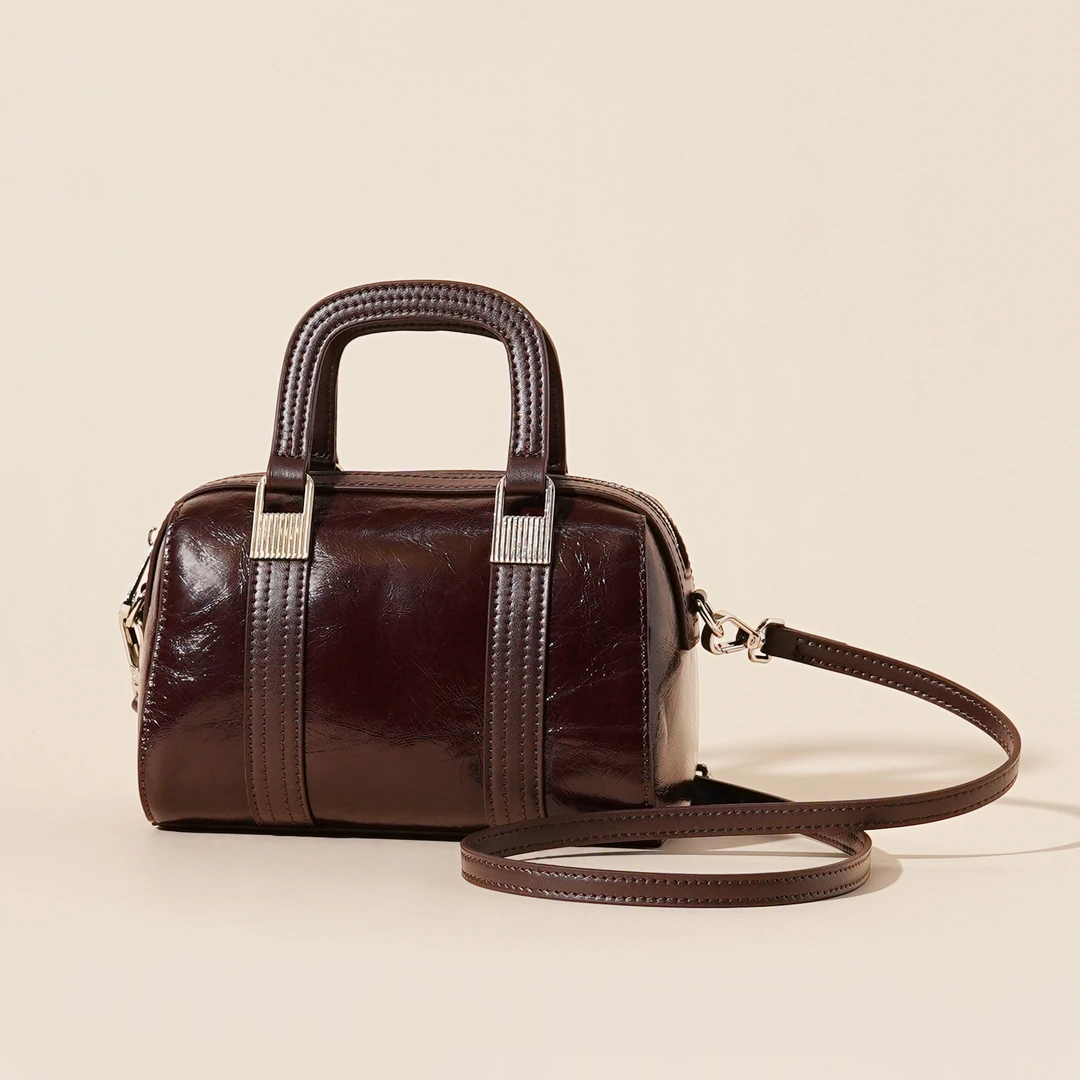 岩牛2024z秋冬新款手提单肩斜挎复古简约时尚女士包包YN3491