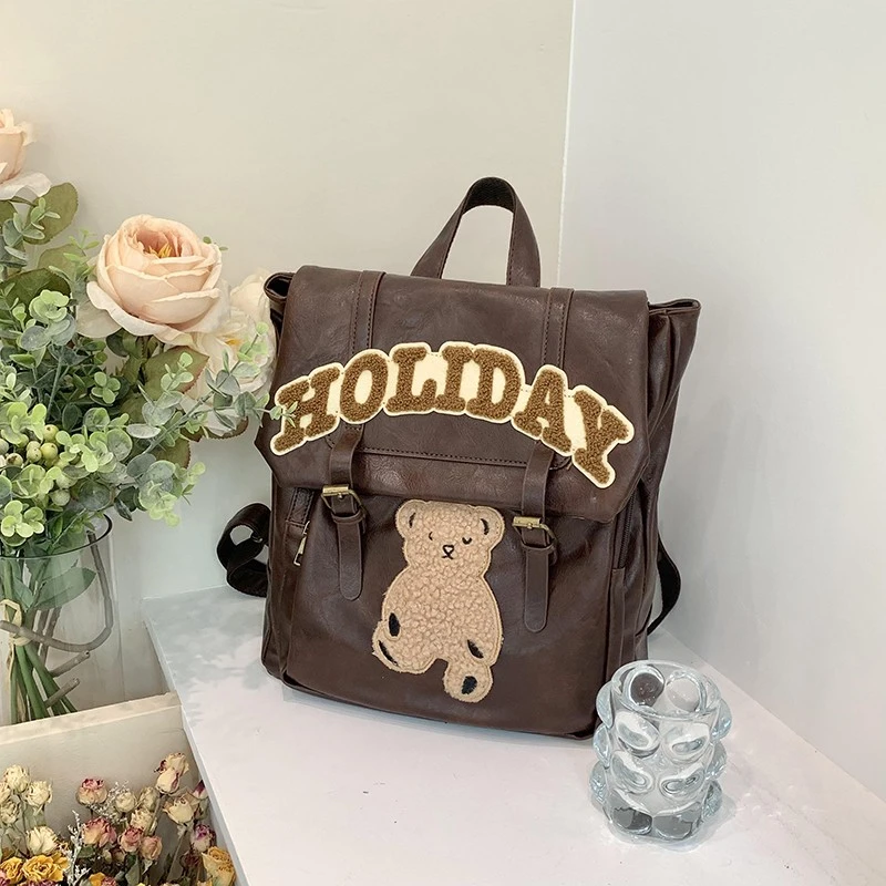 秋冬新款学院卡通小熊刺绣高颜值美式复古大容量双肩背包学生