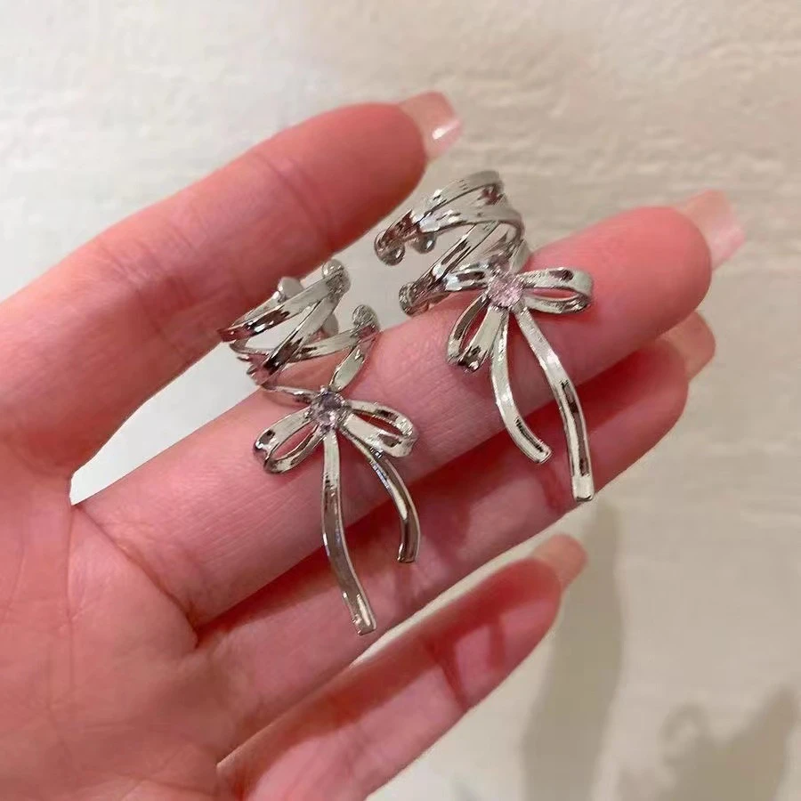 合金耳饰 丝带美学|新款镂空交叉耳夹清冷芭蕾风丝带蝴蝶结耳饰女
