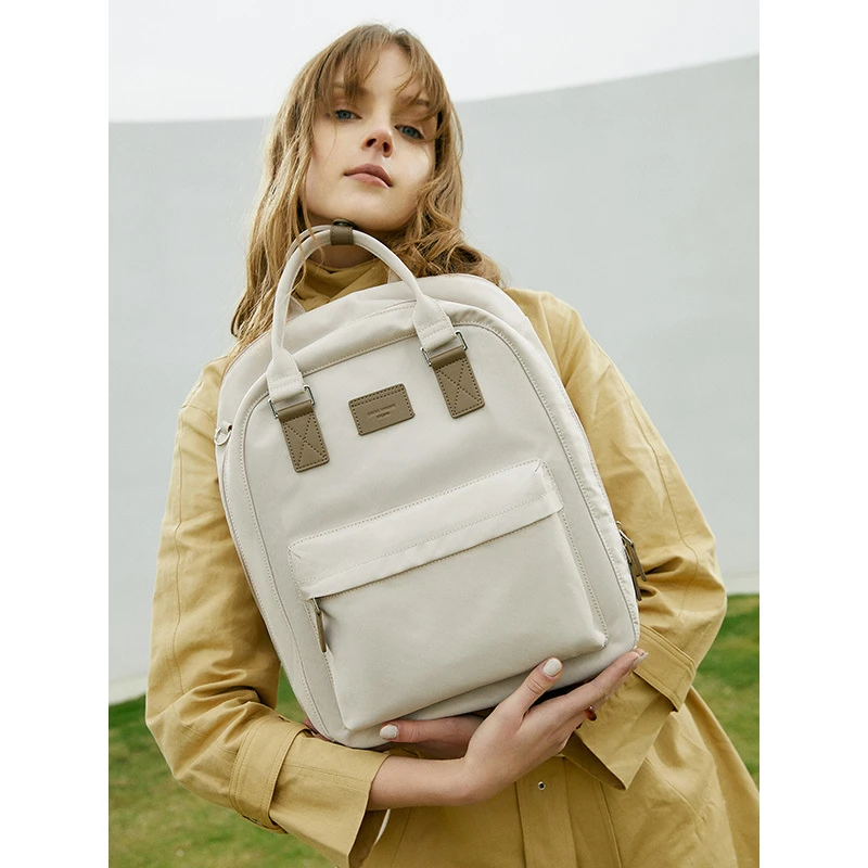 伊米妮包包双肩包通勤上班大容量电脑包旅行包女短途女生双肩背包