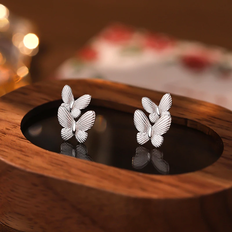 足银耳饰 999足银蝴蝶螺丝耳钉女设计感耳环养耳洗睡免摘简约个性