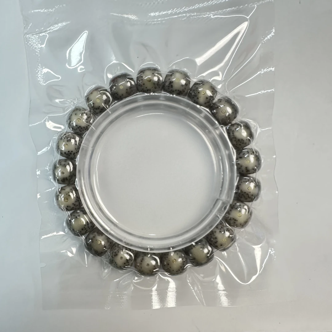 105/石玉料绿包白星月菩提手串 10×9mm