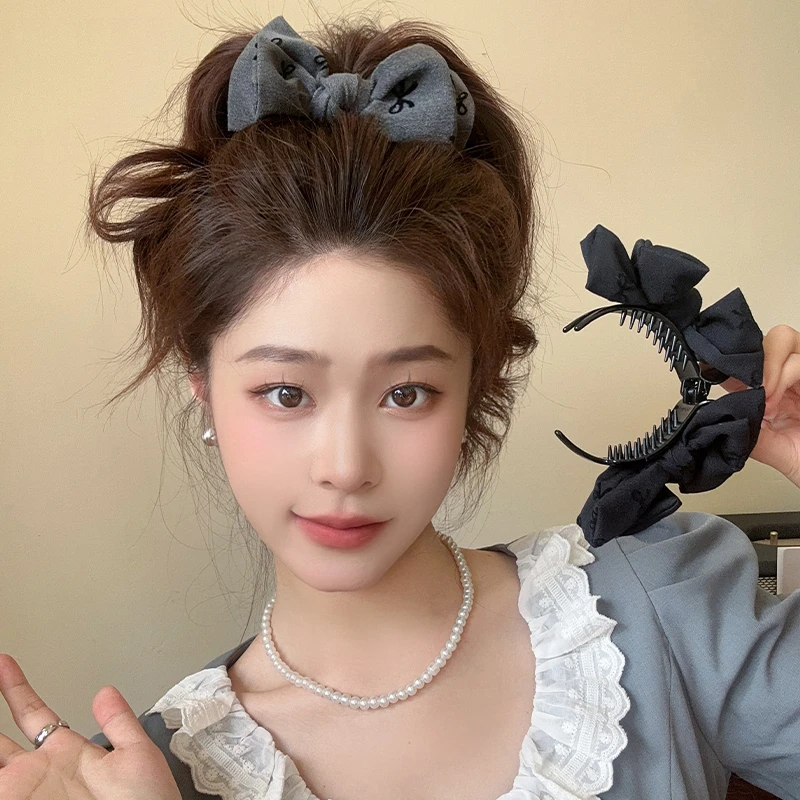 双面蝴蝶结抓夹女高级感高马尾丸子头发夹网红爆款后脑勺夹子头饰