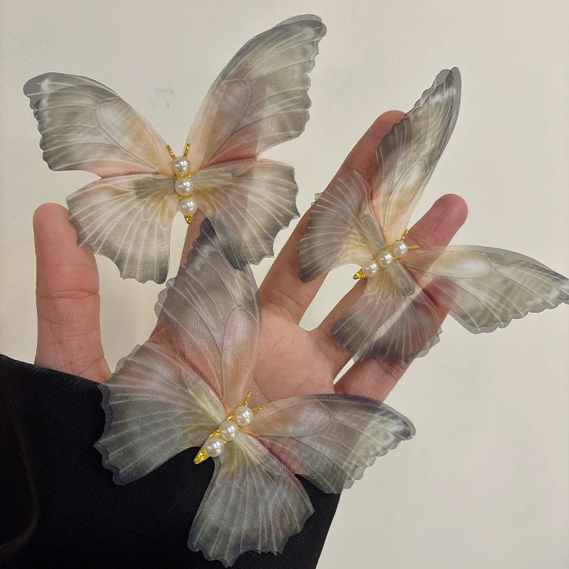 会动的电子蝴蝶发夹女2024新款森系前额侧边刘海鸭嘴夹子拍照道具