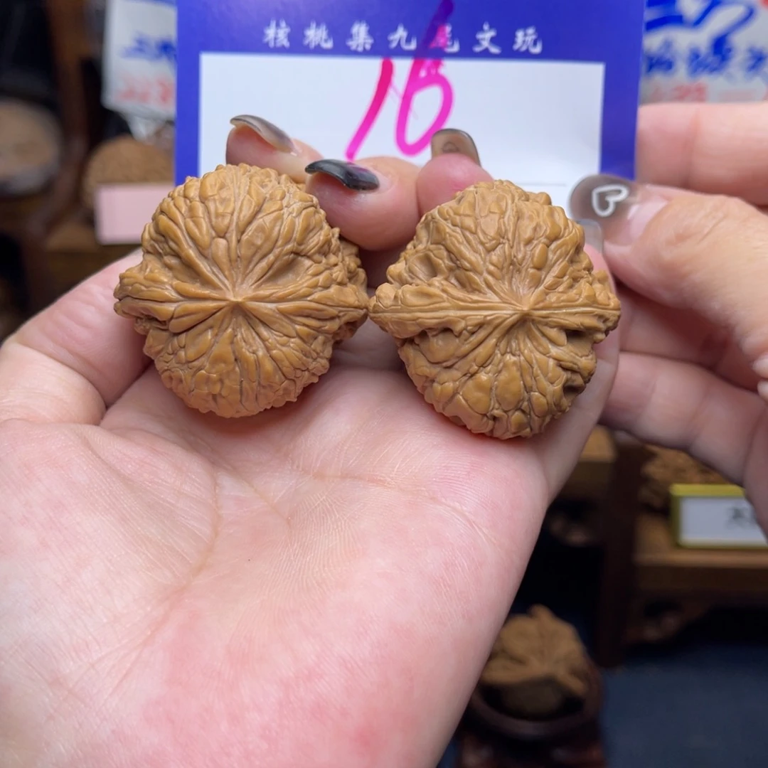 桃核把件闷敦38李。