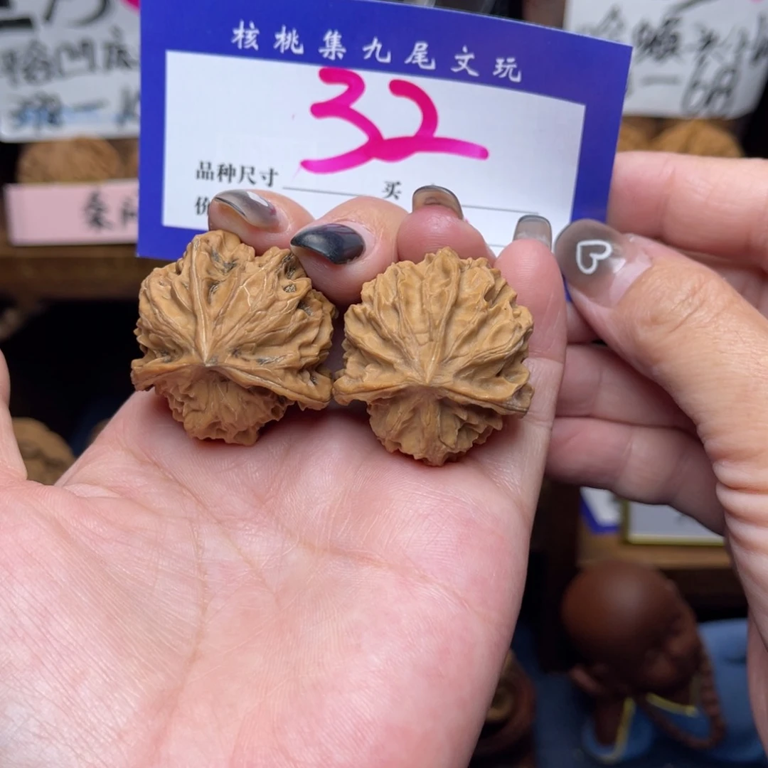 桃核把件七山三棱34李。