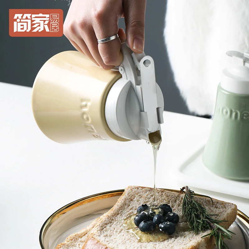 日本进口陶瓷蜂蜜瓶液体挤按压式蜂蜜壶易清洗储物密封罐