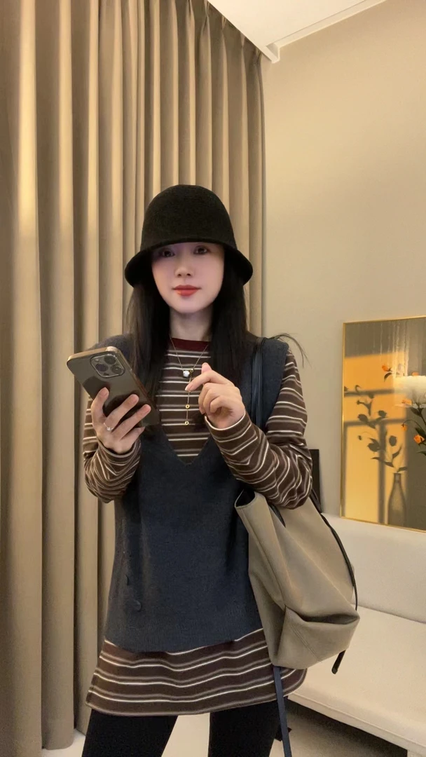 安迪绒贝壳扣百搭简约时尚针织马甲女F73