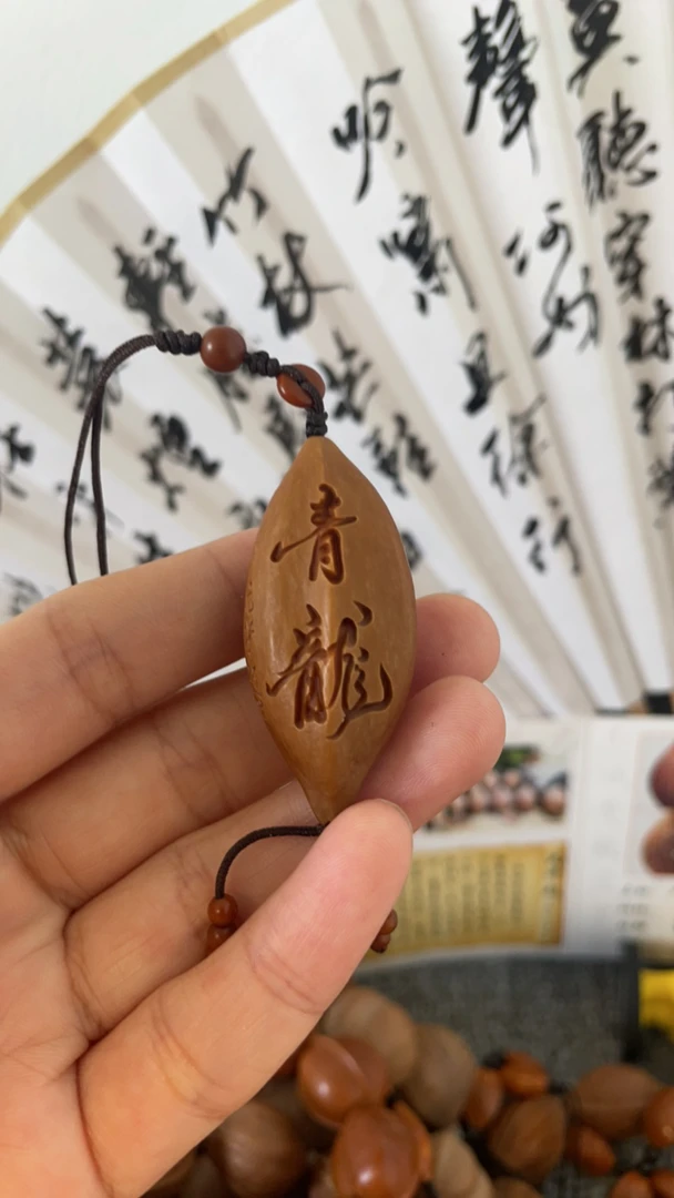 橄榄核雕稀有两花核亢泽超老师雕刻青龙