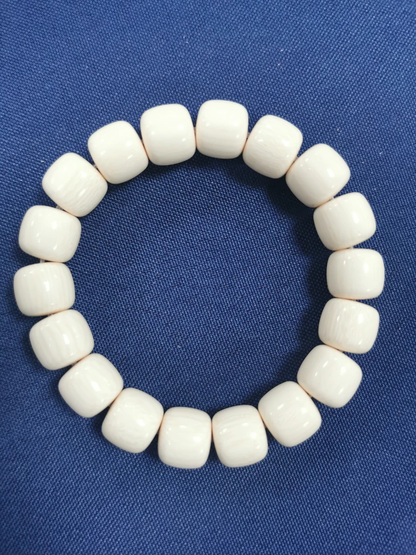 A604猛犸牙手串11*12桶珠