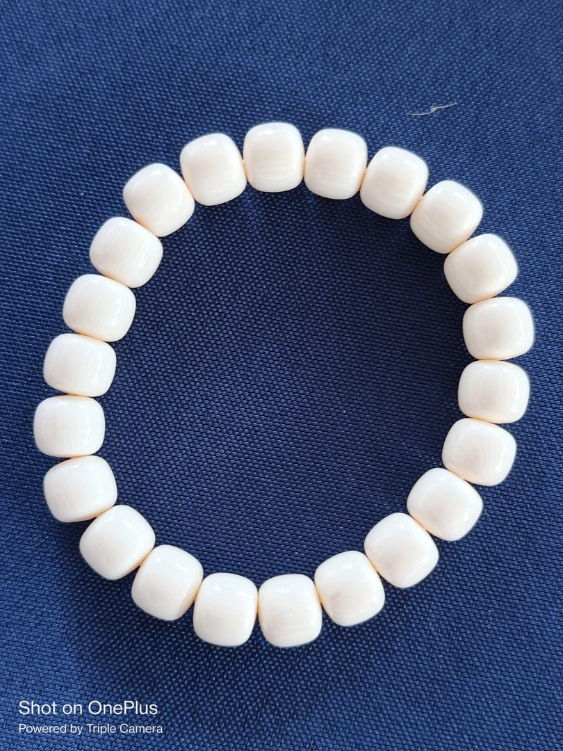 A122猛犸牙桶珠9*10