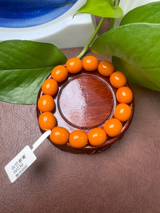 w015古巴新蜜橘色枣珠手串14x15