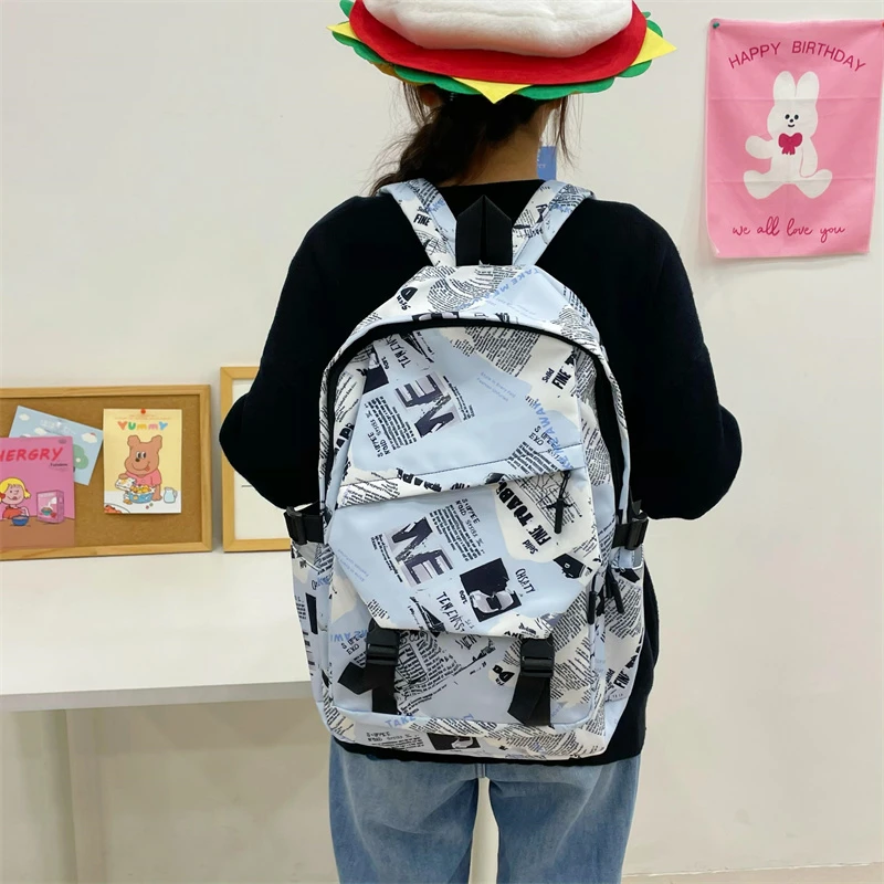 书包男女同款初高中生潮酷个性时尚日系报纸涂鸦双肩包