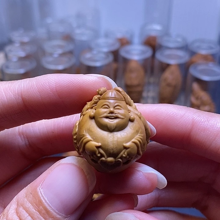 橄榄核吊坠买**用地主一家