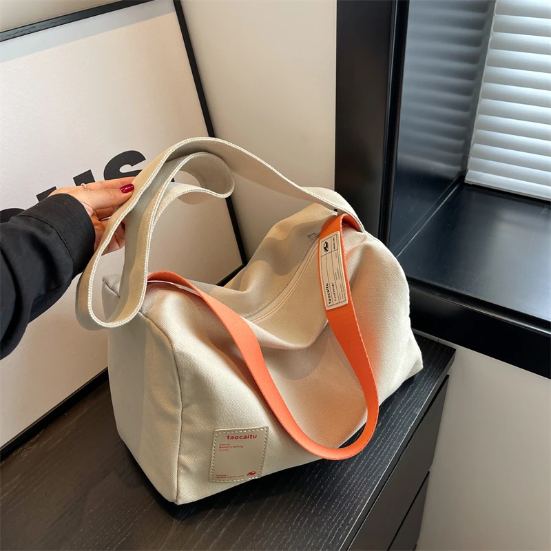 斜挎帆布包女2024新款时尚大容量吐司枕头包高级感单肩通勤托特包