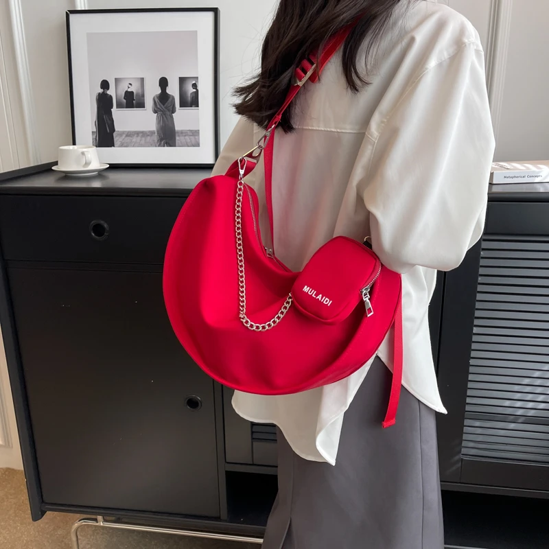 春夏百搭2025新款单肩斜挎包质感大容量包包女士小众饺子包