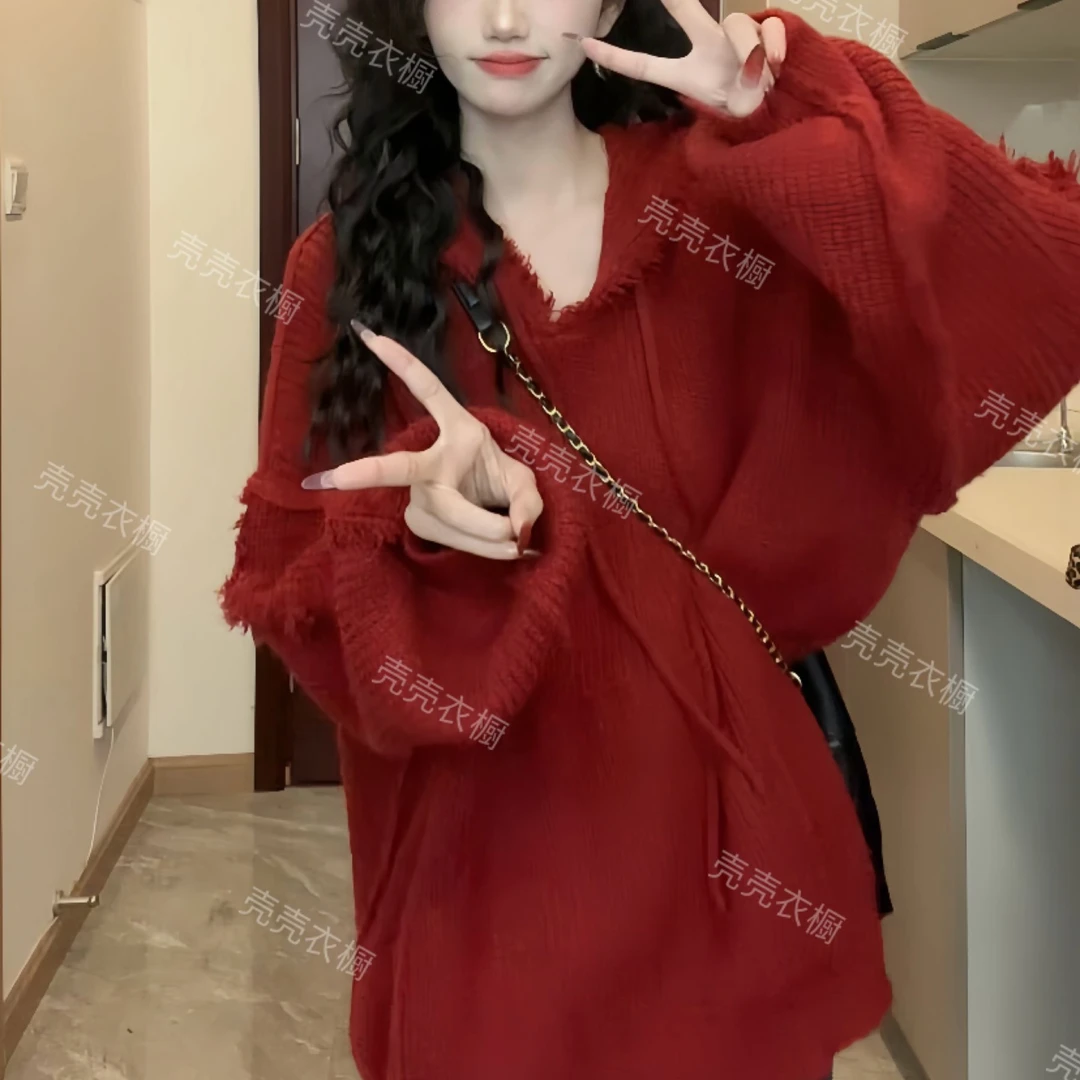 秋冬新款女装高级感网红时尚慵懒风穿搭流苏连帽长袖针织毛衣上衣