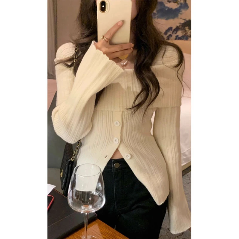 2024早春新款一字肩毛衣女高级感气质修身显瘦收腰长袖针织衫上衣