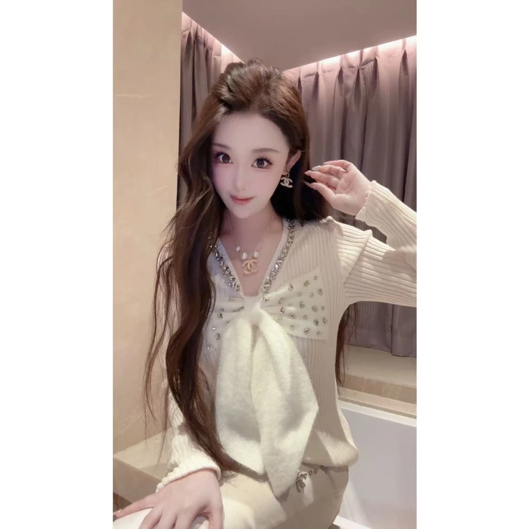 JY&JY橙子大大【蝴蝶结】重工缝钻蝴蝶结针织毛衣上衣 16012