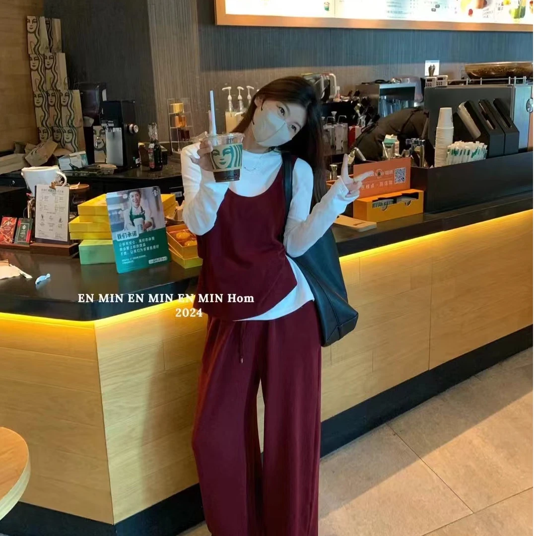 87086不费力气搭配 韩档口实拍圆领打底衫背心拖地裤三件套