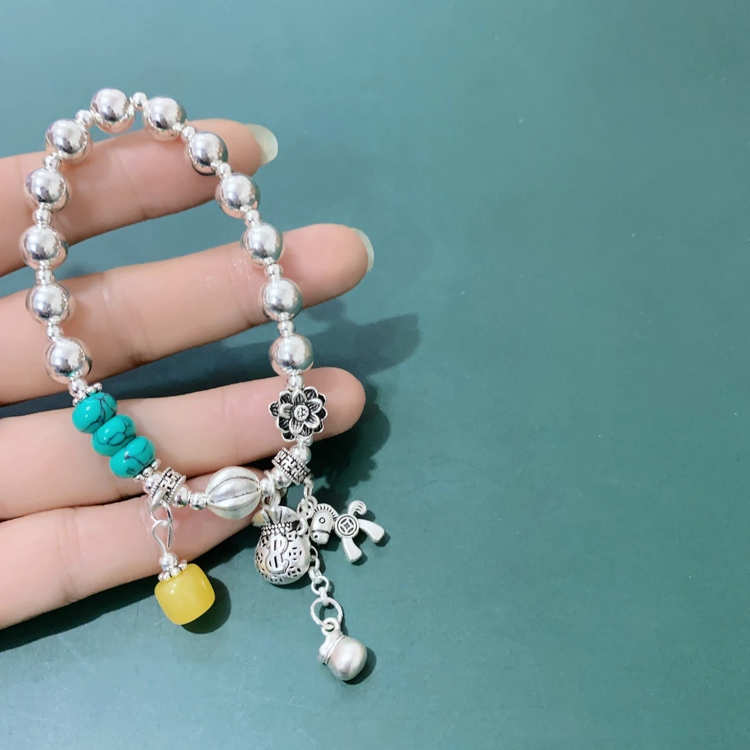 合金亚克力手链 新款莲花马上有钱流苏弹力手链松石多宝钱袋手串