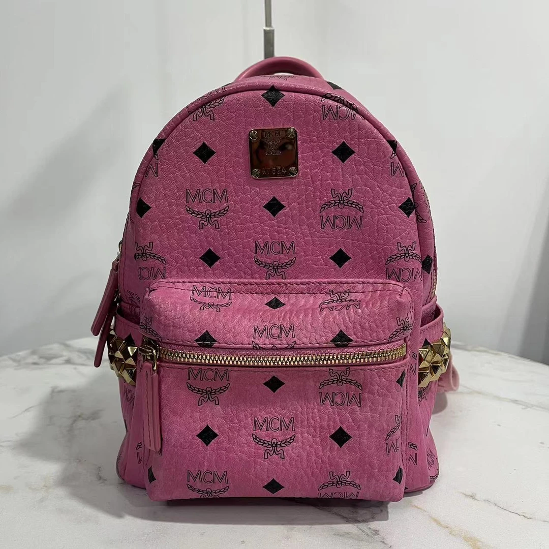 95新 MCM 七言/mcm玫粉色小号双肩包/95新