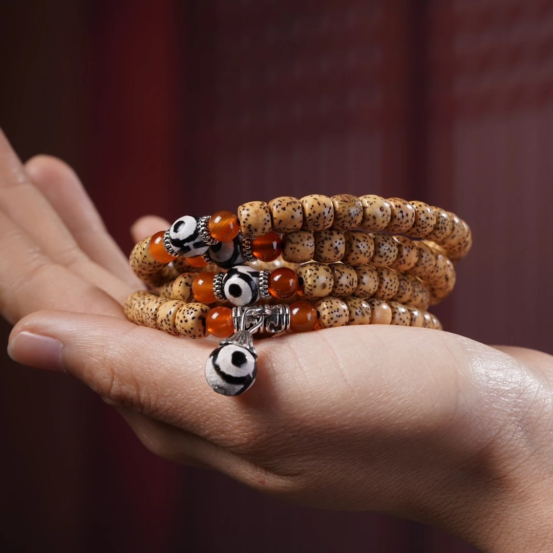 星月菩提鸡油黄直切款手串手持挂件尺寸：6X7文玩好物