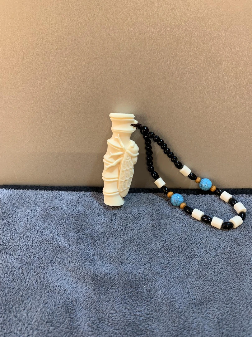 象牙果雕刻一鸟惊人手把件2/3/8cm（盘玩袋）