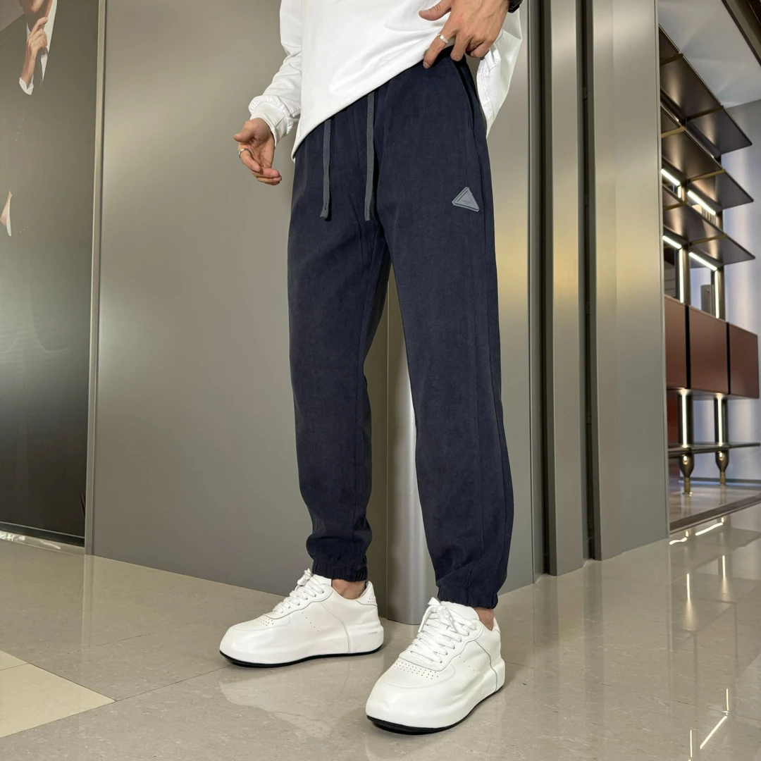 秋冬季新款男士加绒加厚拼接休闲裤时尚百搭宽松显瘦卫裤束脚长裤