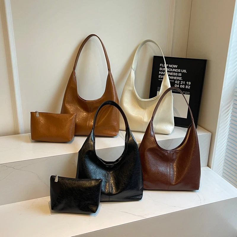 秋冬上新爆裂纹经典时尚单肩包百搭简约手拿包通勤高智美女腋下包