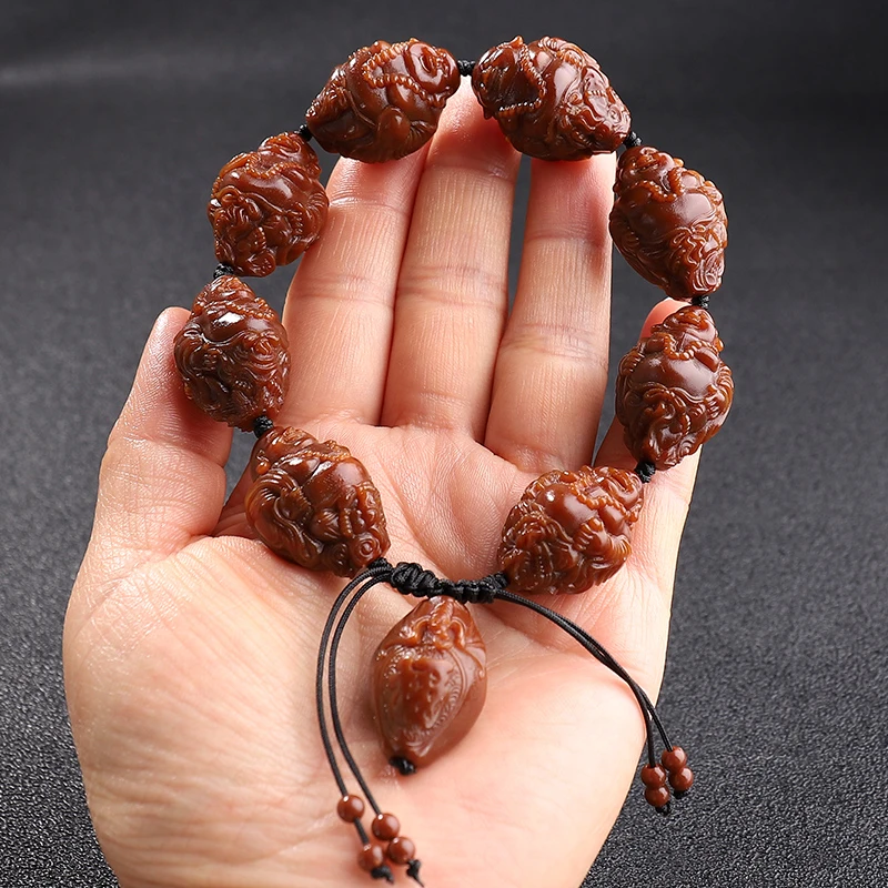 包浆料弥勒橄榄核雕手串2